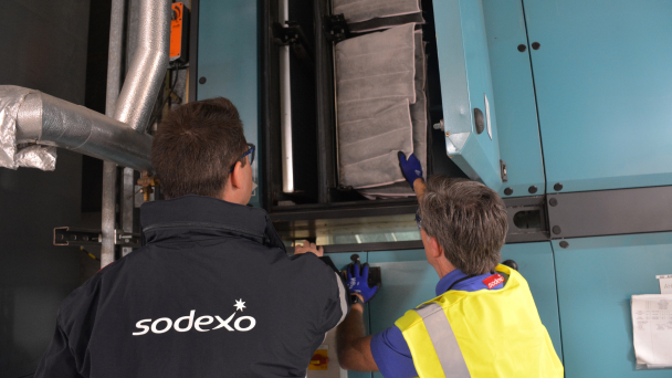 Sodexo employees checking air conditioning filters