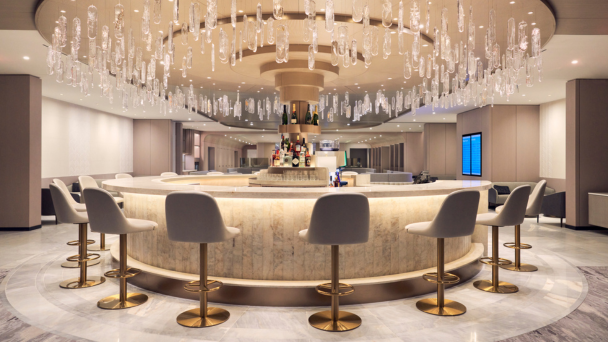 Modern styled circular bar with glass features hanging from the ceiling in an airport lounge