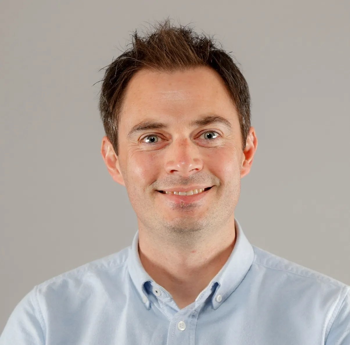 Image of man in a blue shirt