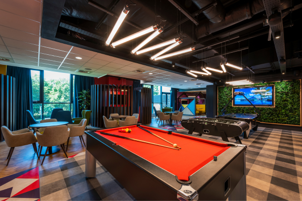 Game room featuring pool tables and a TV.