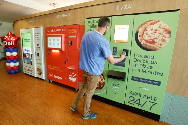National Standards Image - clinical staff member ordering food from 247 deli
