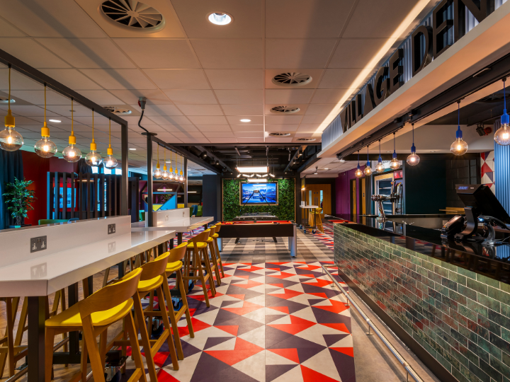 Colorful tiled interior of a vibrant restaurant, featuring a lively ambiance and inviting decor