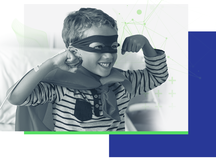 A young boy wearing a superhero costume with a cheerful expression on his face
