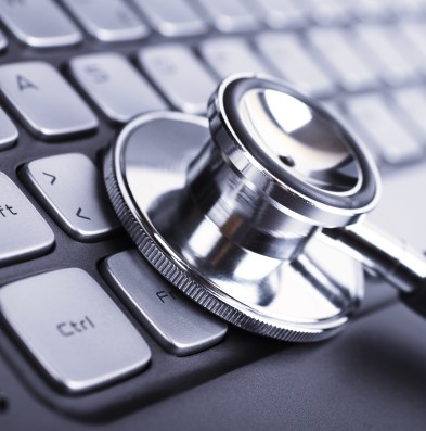 A keyboard and a stethoscope over it