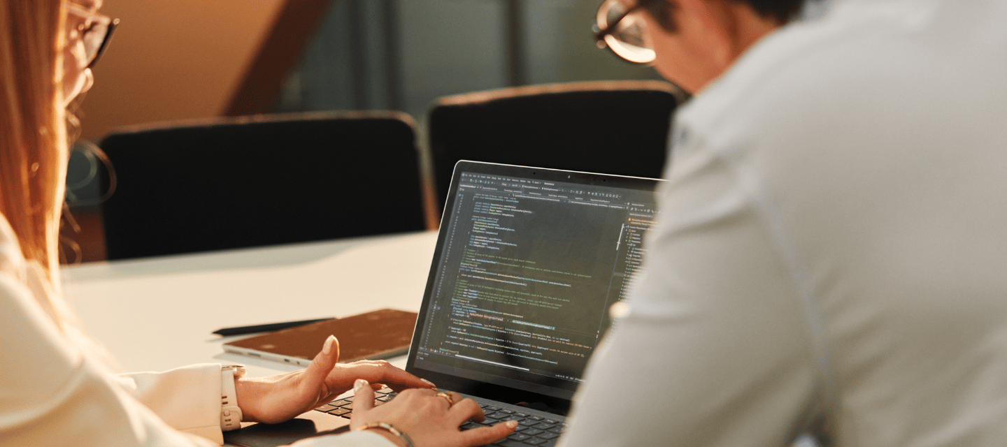 hero_image_looking_at_computer_1440x640