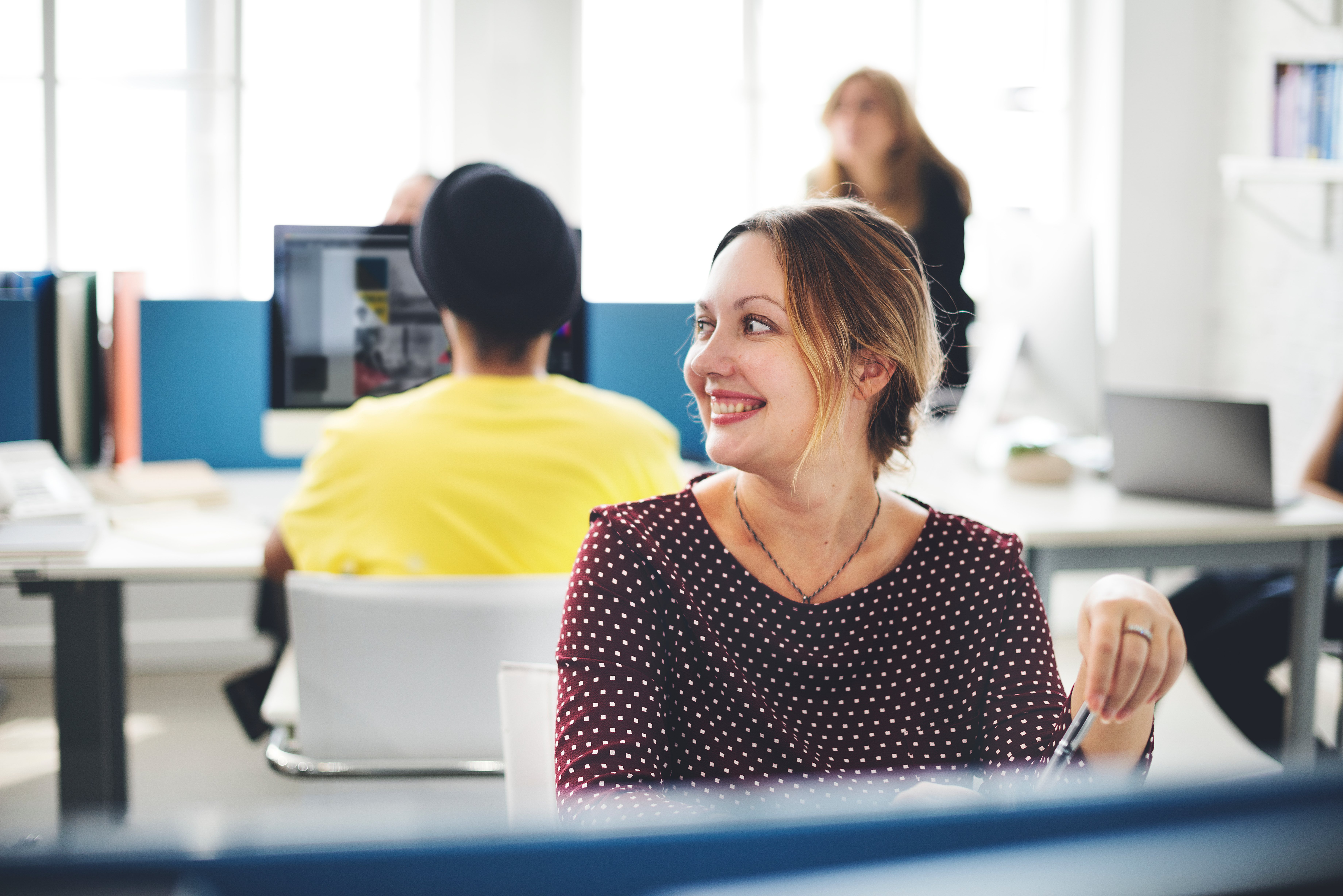 closeup-cheerful-caucasian-woman-working-office
