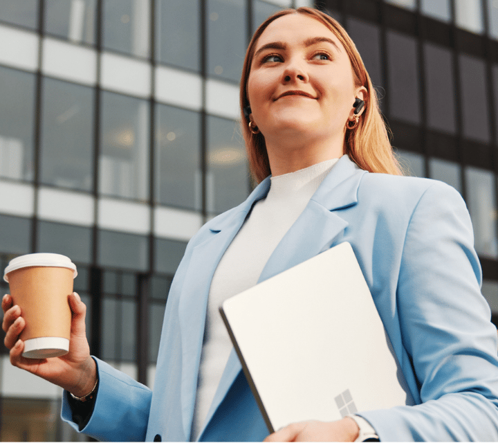 fc_walking_with_coffee_and_earpiece_720x640px