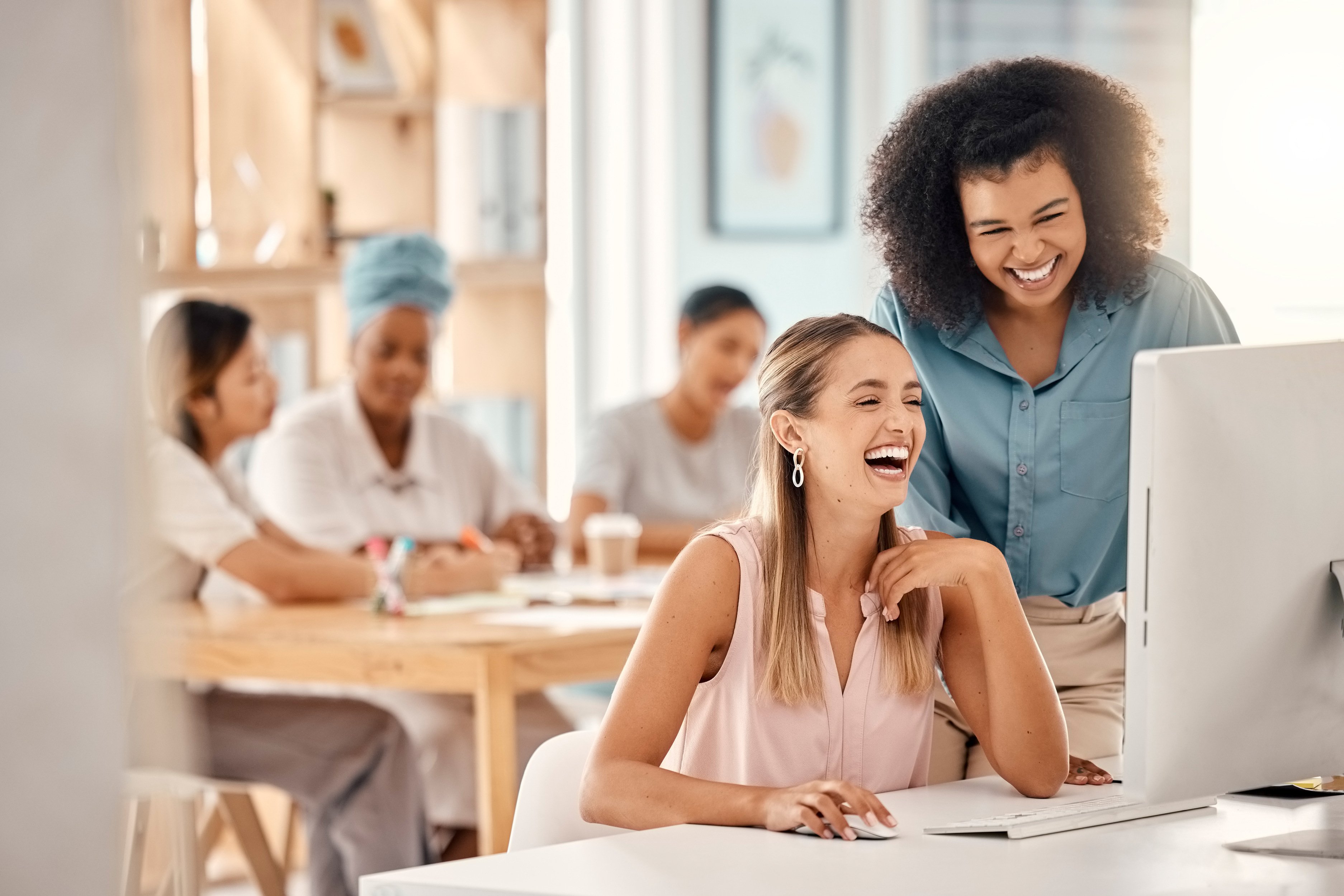 startup-business-women-computer-with-manager-mentor-training-office-while-laughing-having-funny-conversation-ux-creative-design-team-females-talking-about-web-analytics