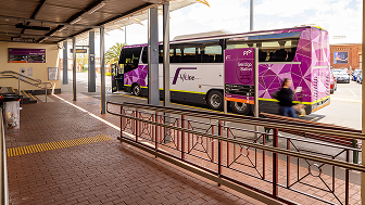 A V Line bus waiting at a regional station