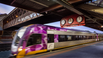 V Line train in motion leaving a station