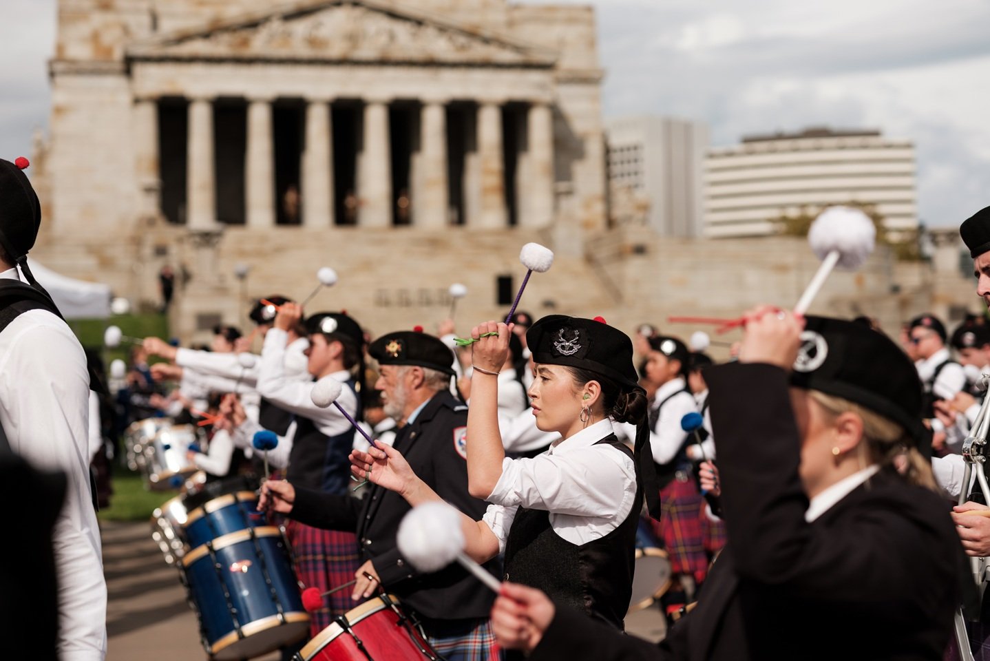 Image of Pipe band playing outside the Shrine of Remembrance on Anzac Day