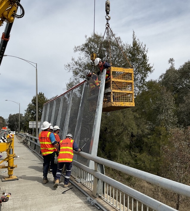 Crews onsite during works to install the public safety barriers