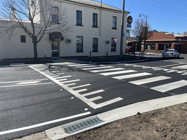 Image of new raised safety platforms now installed at intersection of Pyrenees Highway (High Street) and Inkerman Street, Maryborough. 