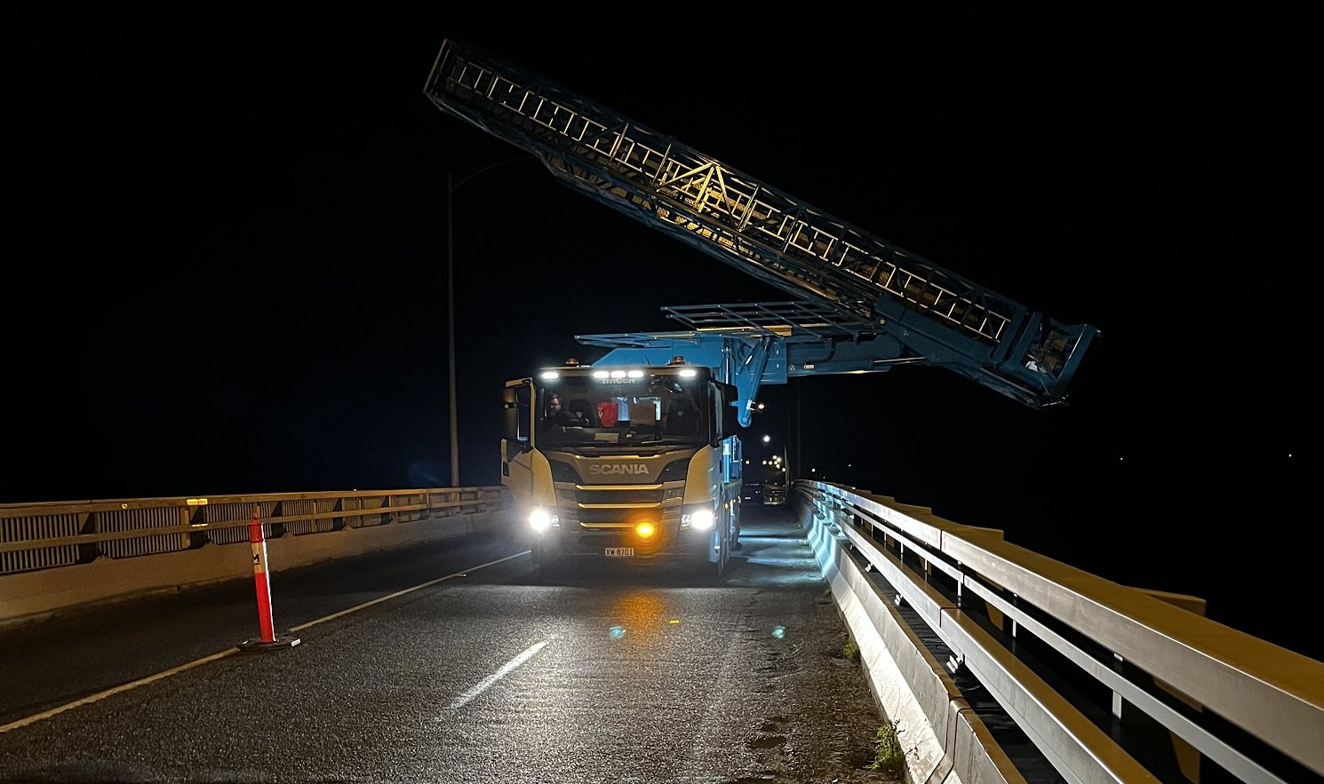 Image of a crane at night on the San Remo/Phillip Island bridge
