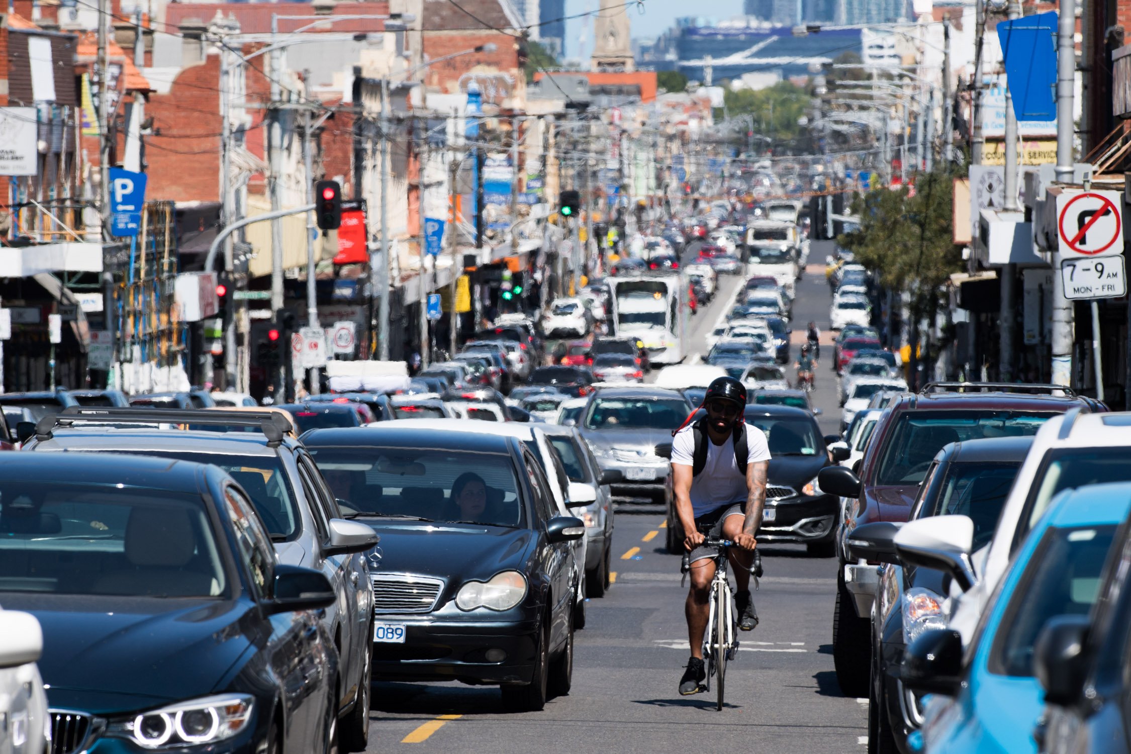 city-tram-cars-cyclist