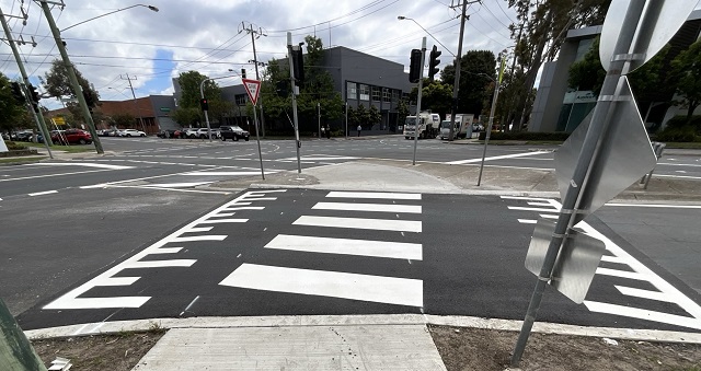 Image of the new raised pedestrian crossing installed on the left turn slip lane on Graham Street onto Plummer Street