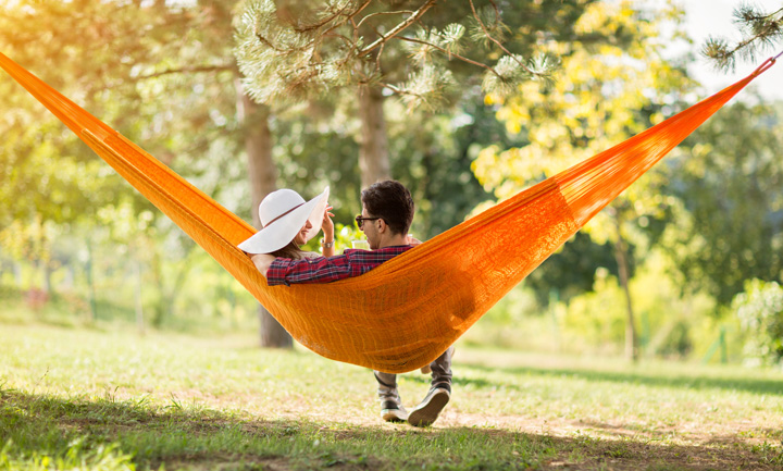 couple in orange hammock