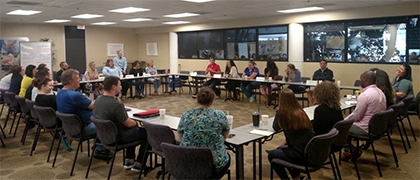 Suncoast employees participate in a roundtable discussion on leadership