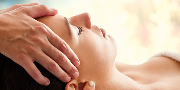 Woman getting head massage