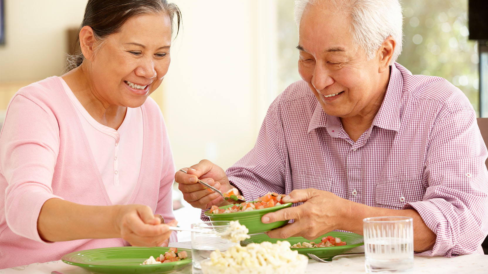 Older couple eat a healthy meal together