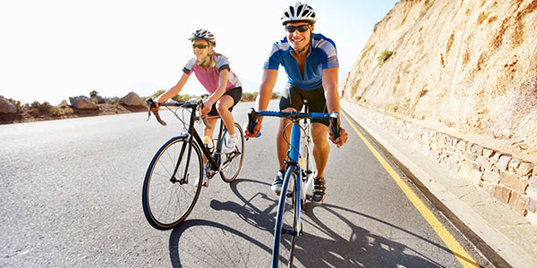 Couple riding bikes