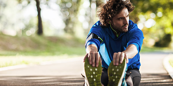 Man stretching before running