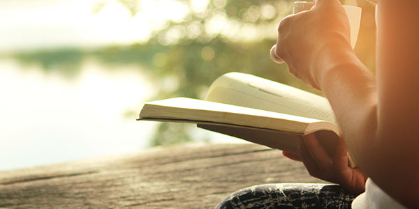 Reading book outside