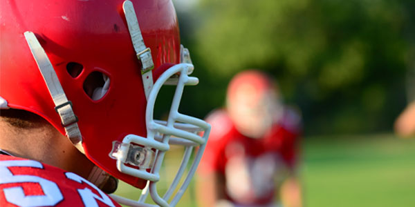 Football player with helmet