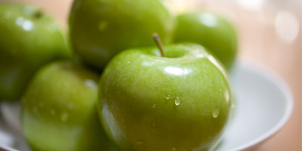 Green apples in a bowl