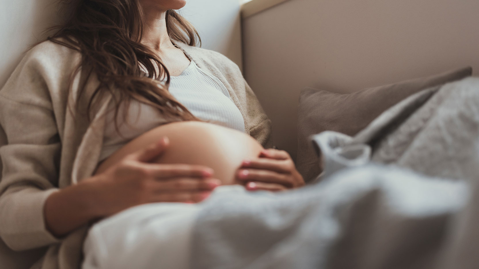 pregnant-woman-holding-belly