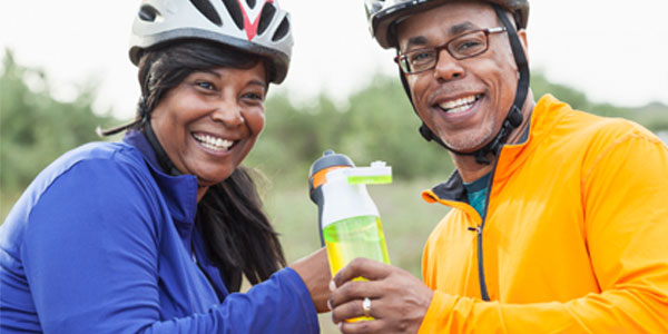 Mature Afrtican-American couple with bikes
