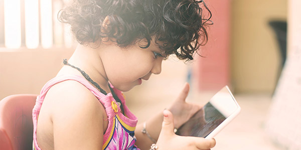Little girl on tablet