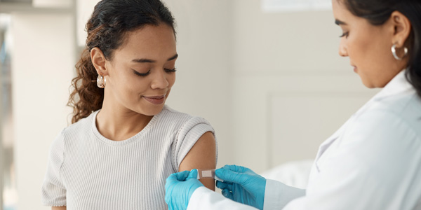 Pregnant woman getting vaccine