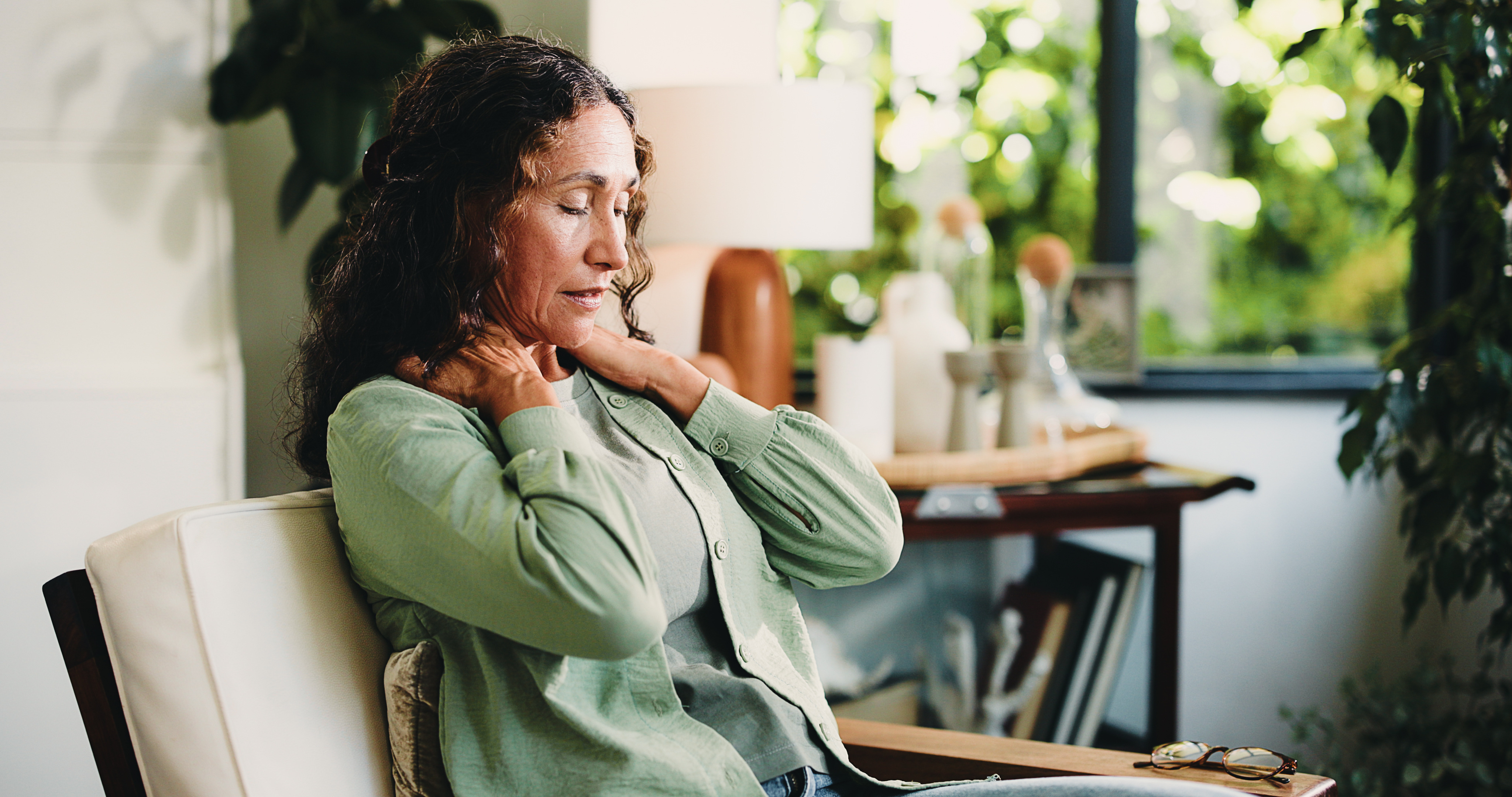 Woman with a headache sitting down