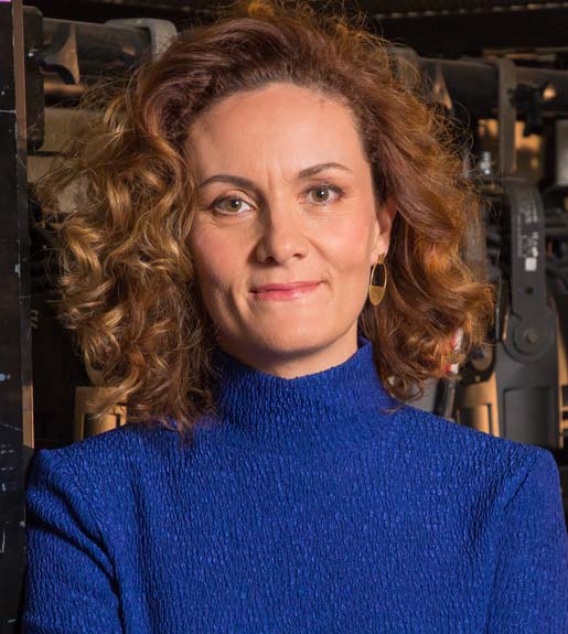 Headshot of Claire Spencer | Photo credit Mark Gambino