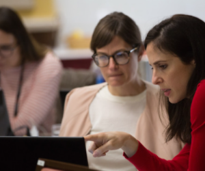 Tessitura team member teaches a student at training course.