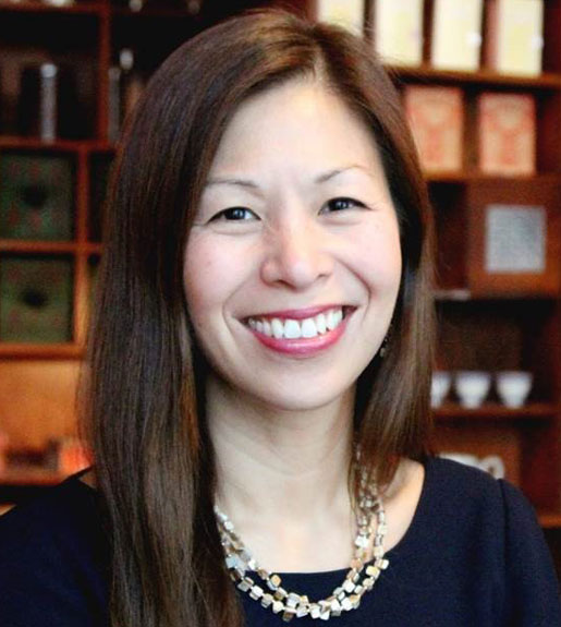 Nancy Yao, seen from the shoulders up, facing forward and smiling.