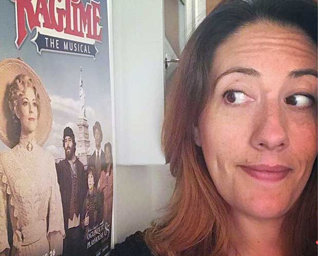 Morgan Gavaletz, looking to the left and slightly smiling