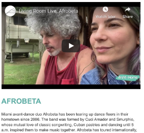 Screenshot of YouTube with title 'Living Room: Afrobeta' showing a close up of a women's face with a man sitting next to her.