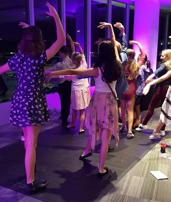 Ballet Austin audience members take a ballet class in the lobby