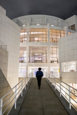 A guest walks through the High Museum of Art.
