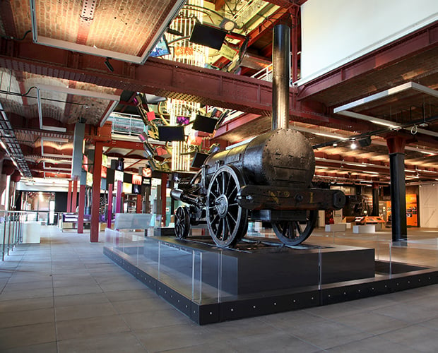 The iconic Stephenson's Rocket locomotive at the Science and Industry Museum in Manchester, UK.