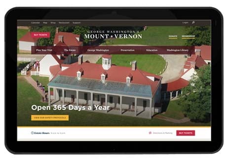 A tablet showing Mount Vernon's homepage with the words "Open 365 Days a Year"