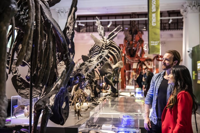 Two visitors in the Australian Museum's dinosaur gallery