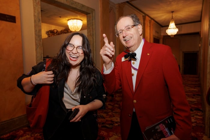 A guest and an usher together at Opera Philadelphia's production of The Listeners.