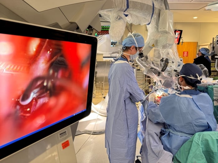 Susanna Howard, MD operating with Visish Srinivasan, MD