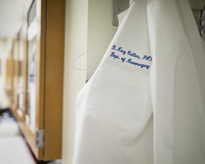 Dr. Kacy Cullen's labcoat hanging on a hook.