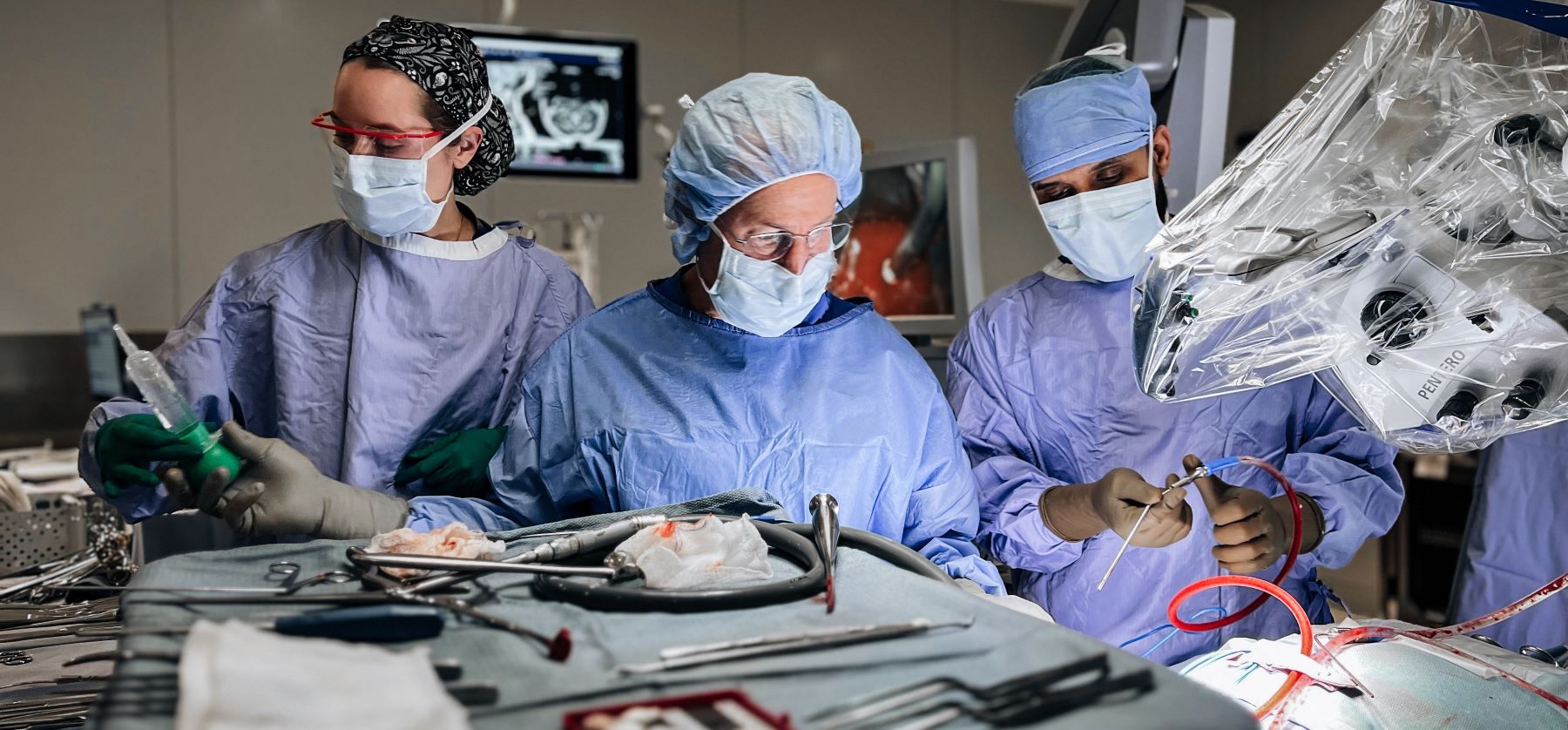 Dr. Paul Marcotte in the OR with resident Yohannes Tsehay.