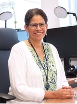 Elizabeth Howell at desk
