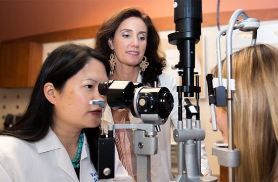 Doctor conducting eye exam